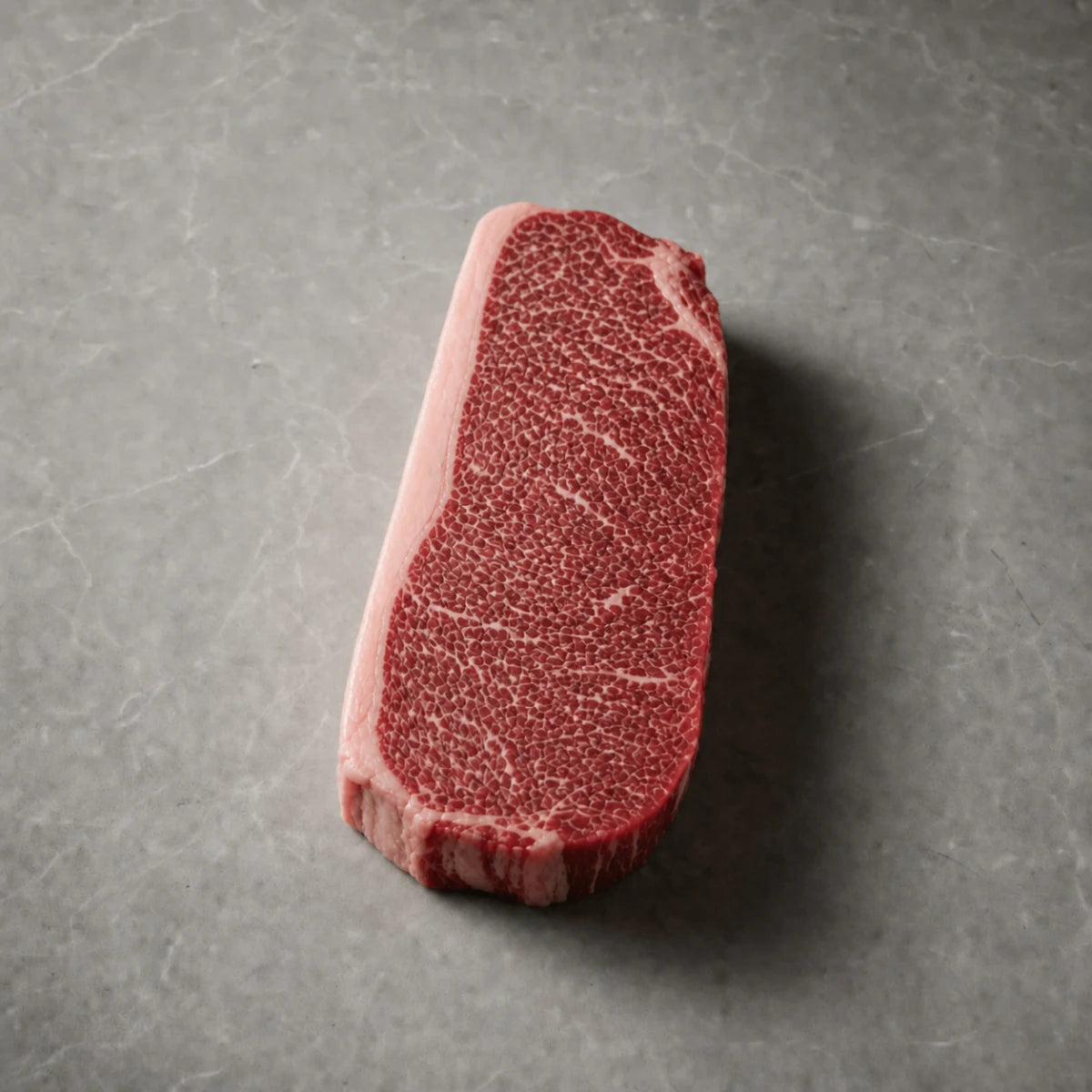 New York Strip steak showing BMS 4-5 marbling